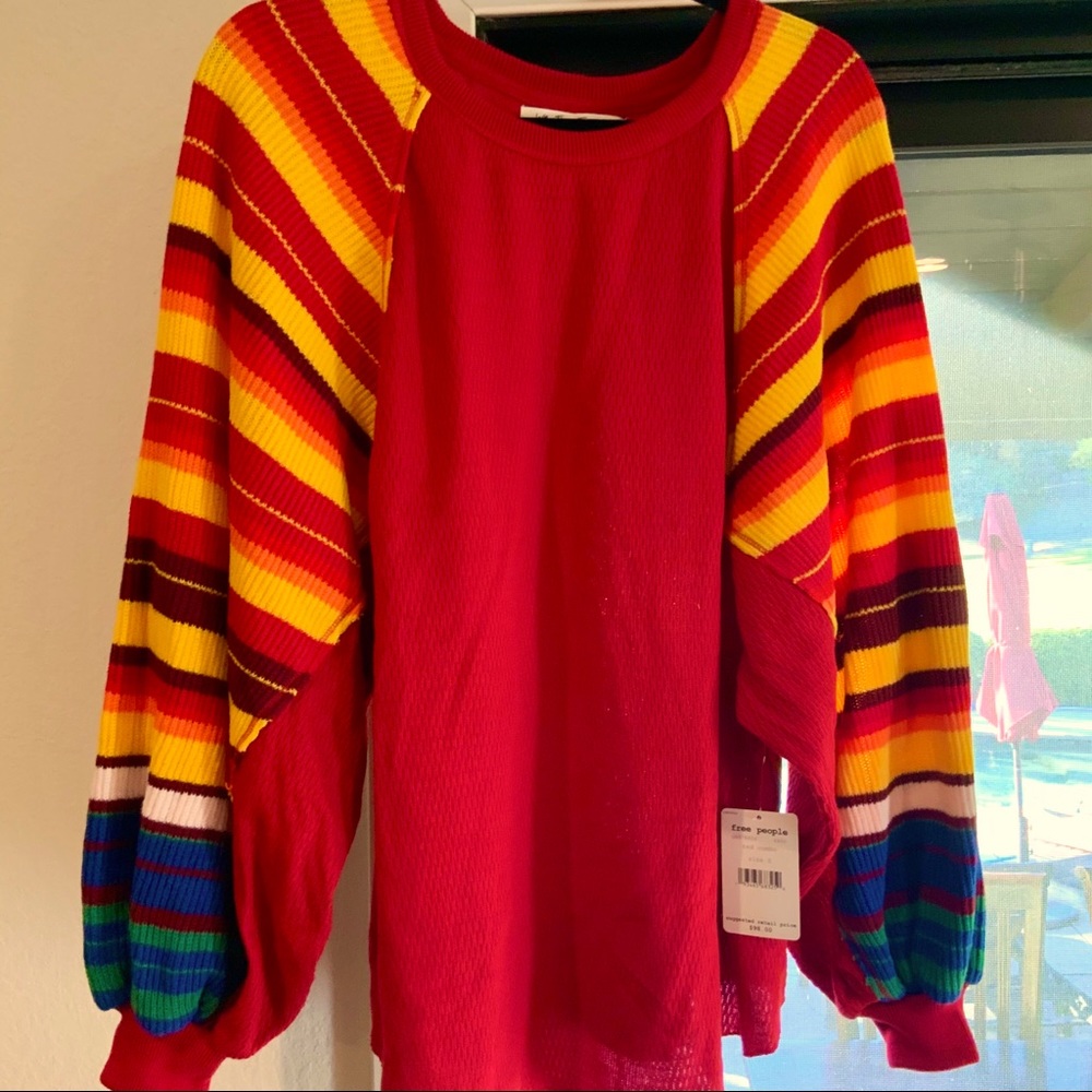 New with tags festive and fun
Free People puffy sleeve thermal top zize small.